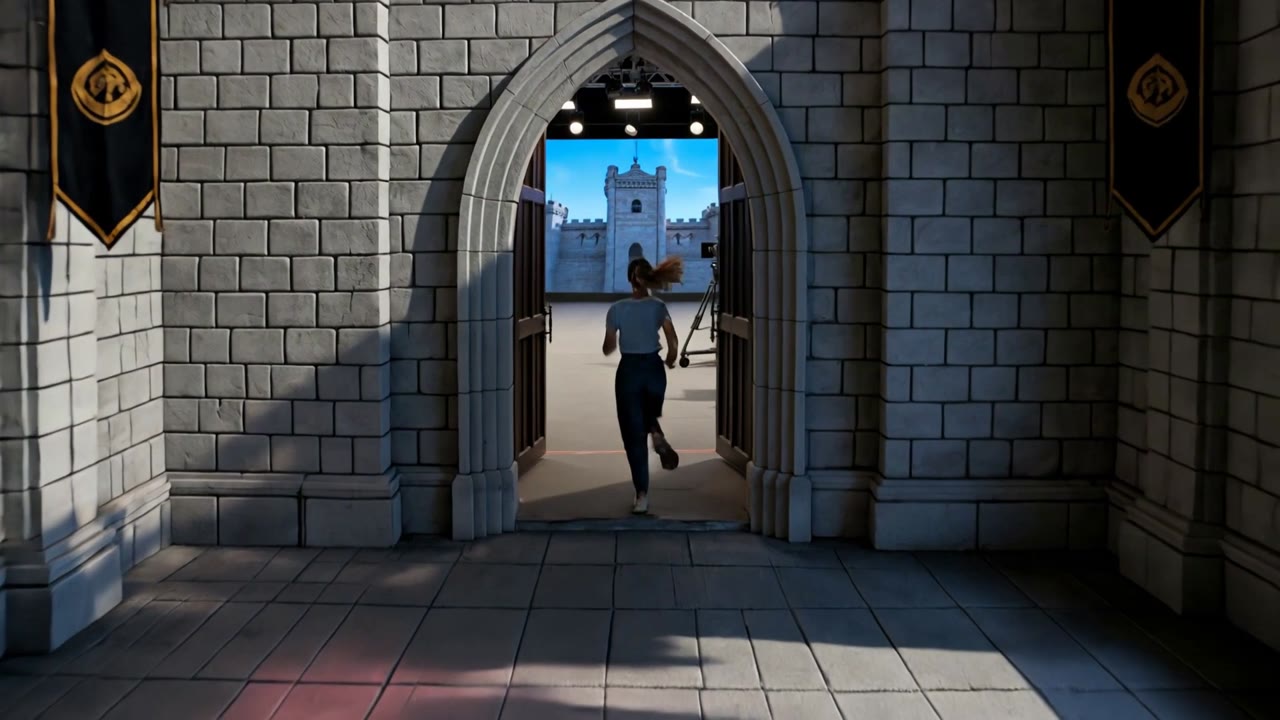 A woman runs through a castle corridor onto a virtual production stage